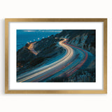 Framed landscape wall art featuring a serene road scene, adorned with a gold mat and frame, perfect for enhancing home decor with elegance.