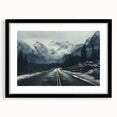 Black-framed wall art depicting a scenic landscape with winding roads, designed to enhance modern home decor, featuring a mat for added elegance.