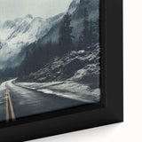 Framed canvas wall art showcasing a vibrant landscape design featuring winding roads and lush greenery, perfect for adding depth and color to modern interiors.