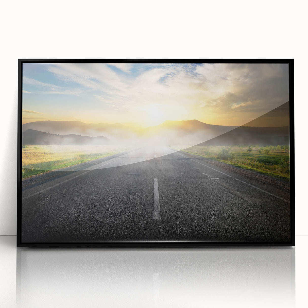 Framed acrylic wall art showcasing a scenic landscape with winding roads, presented in a sleek black frame, perfect for modern home decor.
