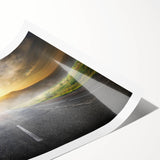 Abstract landscape wall art print showcasing a winding road through vibrant green fields under a blue sky, rolled for easy shipping and display. Perfect for modern home décor.