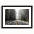 Framed wall art featuring a black landscape road design with a mat, set against a sleek black frame, perfect for modern home decor and interior design aesthetics.