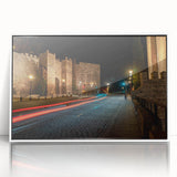 Framed wall art featuring a scenic landscape with winding roads, set in a white frame, showcasing vibrant colors ideal for home décor. Perfect for nature lovers.