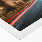 Rolled canvas wall art showcasing a serene landscape with winding roads and vibrant greenery, ideal for home decor, packaged securely in a protective tube.