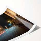 Vibrant rolled canvas print showcasing a scenic landscape with winding roads, perfect for home decor. The design features lush greenery and a serene sky, ideal for nature enthusiasts.