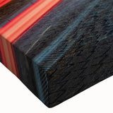 Close-up of a stretched canvas artwork depicting a serene landscape with winding roads and vibrant colors, perfect for enhancing home décor and creating a calming atmosphere.