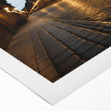 Vibrant rolled canvas artwork showcasing a scenic landscape road design, featuring lush greenery and a clear blue sky, ideal for modern home decor.