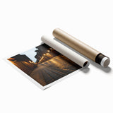 Rolled wall art print showcasing a vibrant landscape road design, featuring rich colors and intricate details, packaged securely in a durable tube for delivery. Perfect for enhancing home decor with artistic flair.