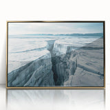 Framed wall art featuring a stunning landscape design with winding roads, presented in a sleek acrylic frame with a gold finish, ideal for modern home decor.