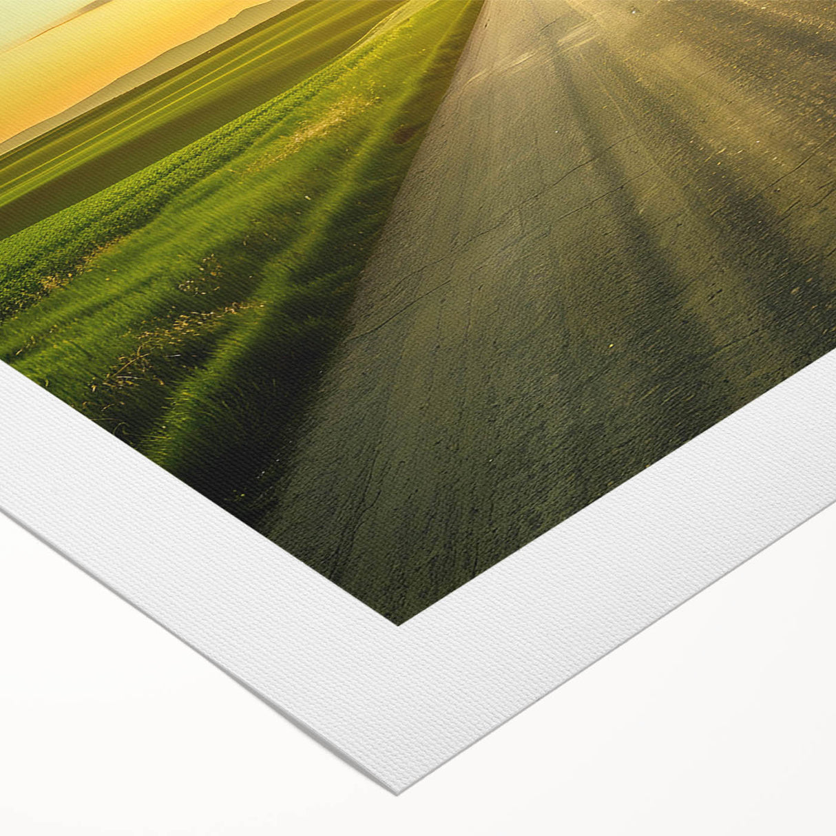 Rolled canvas artwork showcasing a vibrant landscape with winding roads under a blue sky, perfect for home decor or office settings, emphasizing nature's beauty.