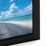 Framed canvas art showcasing a vibrant road landscape design, featuring lush greenery and a clear blue sky. Ideal for home decor enthusiasts seeking nature-inspired wall art.