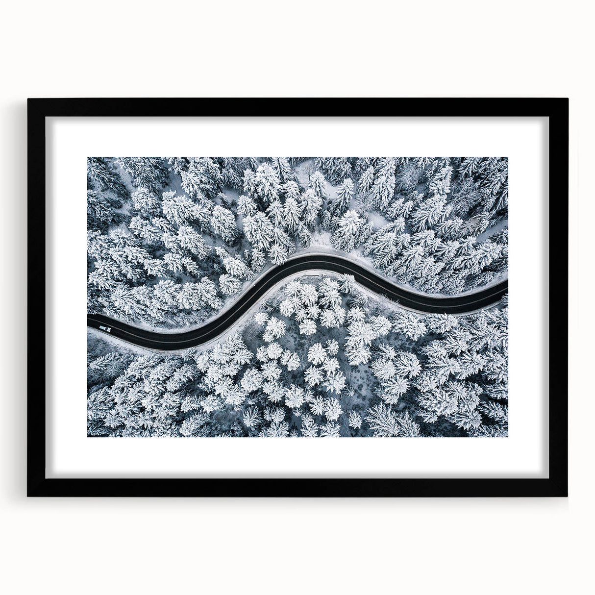 Framed black wall art showcasing a serene landscape road design, highlighted by a white mat, perfect for enhancing modern home decor. Ideal for art enthusiasts.