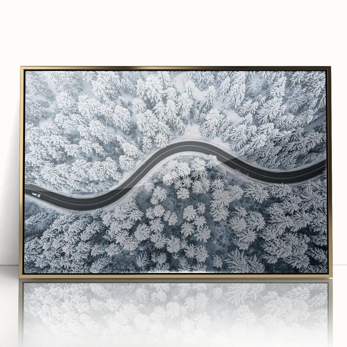 Framed acrylic wall art featuring a scenic landscape design with winding roads and vibrant colors, elegantly displayed with a gold frame, perfect for home decor.
