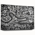 Acrylic glass wall art featuring a vibrant landscape design with winding roads and lush greenery, displayed in a side view with decorative pins, perfect for home decor.