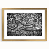 Framed wall art featuring a scenic road landscape design in gold, elegantly matted, showcasing a modern aesthetic perfect for home decor enhancement.