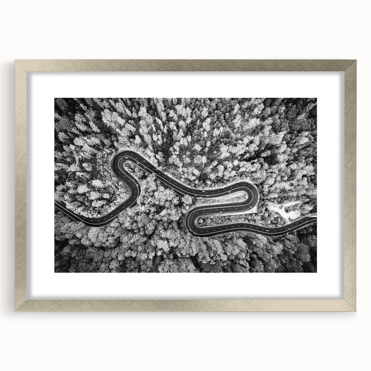 Framed landscape wall art featuring a serene road design with a silver mat, perfect for home decor. The artwork adds elegance to any room, enhancing interior aesthetics.