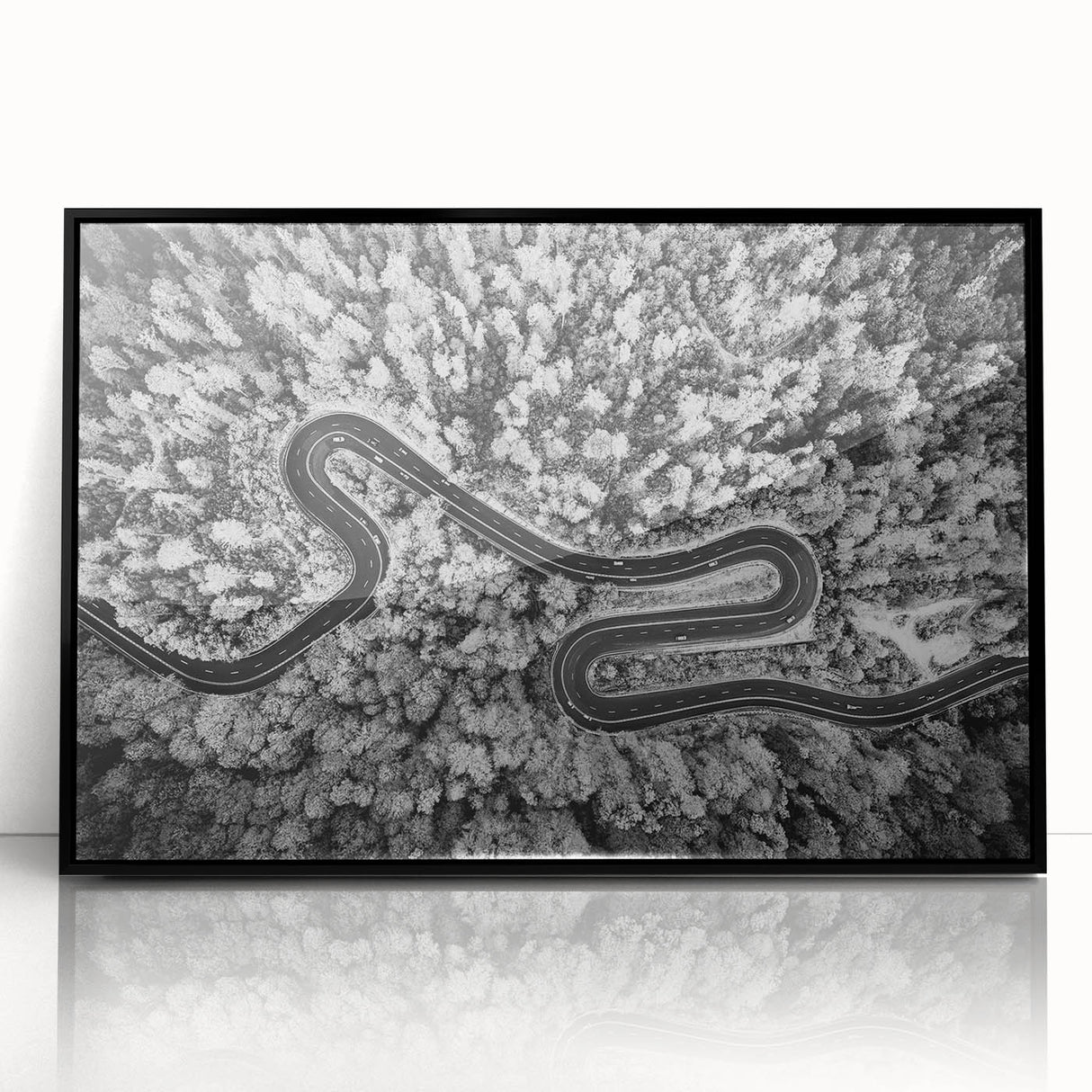 Framed acrylic wall art displaying a striking landscape road design with a black frame, perfect for modern home decor. Ideal for adding elegance to any living space.