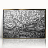 Framed acrylic wall art featuring a modern landscape design with a gold finish, showcasing a serene road through lush greenery, ideal for enhancing contemporary home decor.