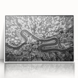 Framed acrylic wall art showcasing a serene landscape with winding roads, set against a bright white background, perfect for modern home decor.