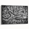 Framed canvas wall art showcasing a scenic landscape with winding roads, featuring a black frame and side view, ideal for modern home décor.
