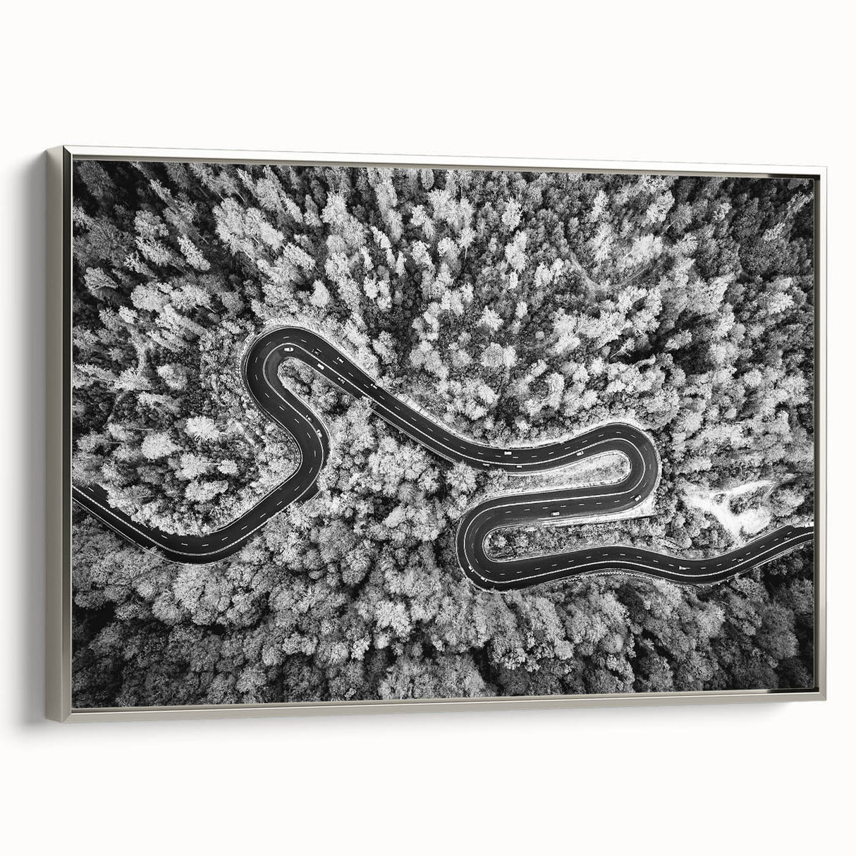 Framed canvas wall art showcasing a serene landscape road design in silver tones, ideal for modern home decor, enhancing any living space with elegance.