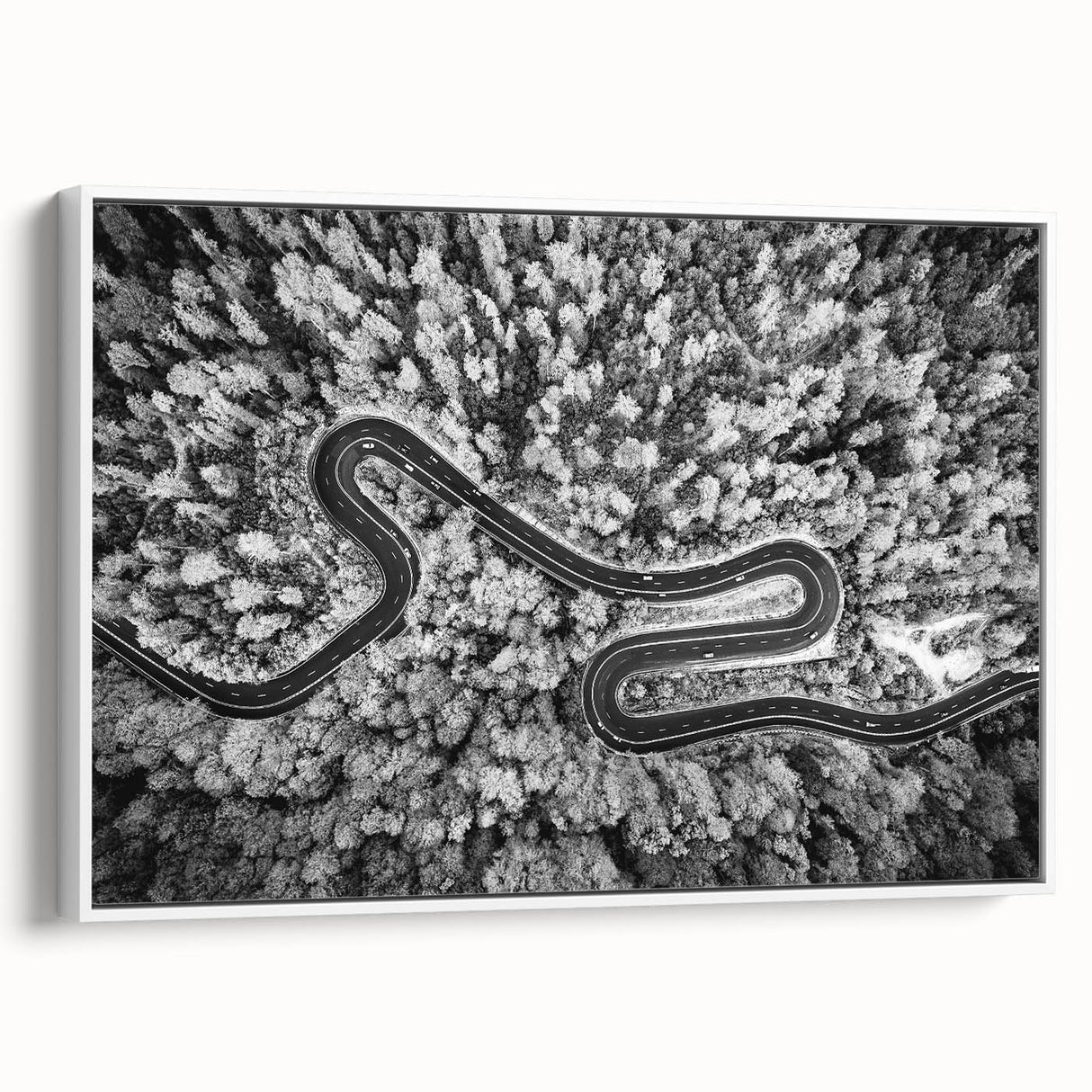 Framed canvas wall art showcasing a scenic landscape of winding roads, featuring vibrant colors and a modern design, perfect for home or office decor.