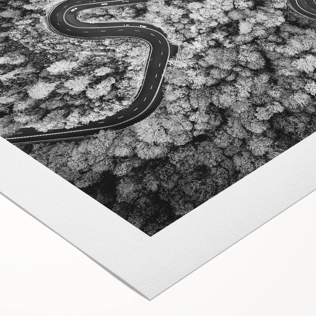 Rolled canvas wall art showcasing a vibrant landscape road design, featuring lush greenery and a winding road under a bright blue sky, perfect for modern decor.