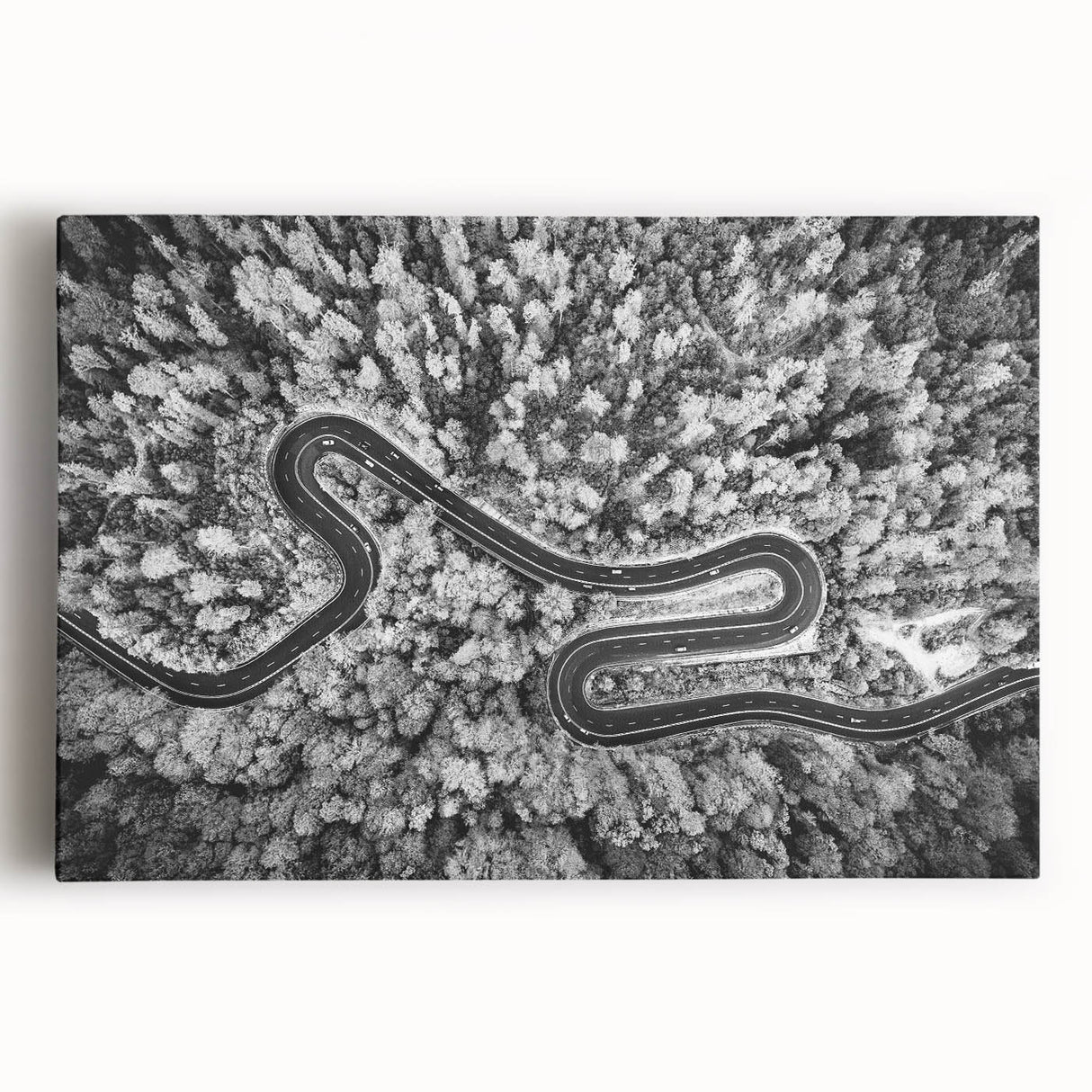 Stretched canvas wall art featuring a vibrant landscape design with winding roads, showcasing vivid colors and intricate details, perfect for home decor enhancement.