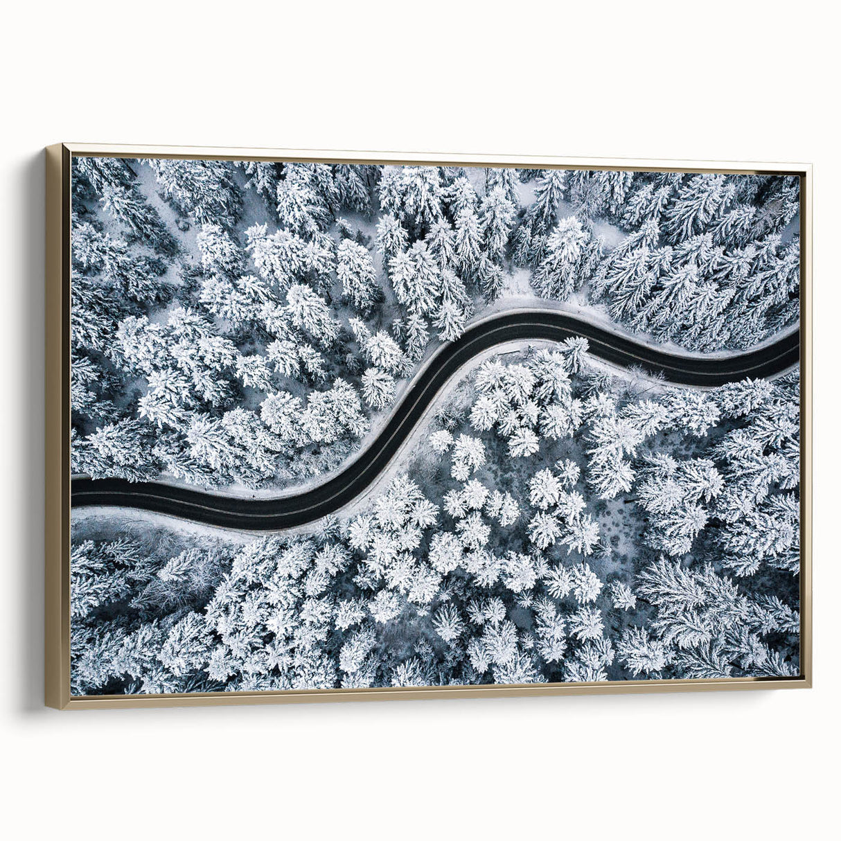 Framed canvas wall art featuring a serene landscape with winding roads and golden accents, perfect for modern home decor. Ideal for adding elegance and tranquility to any space.