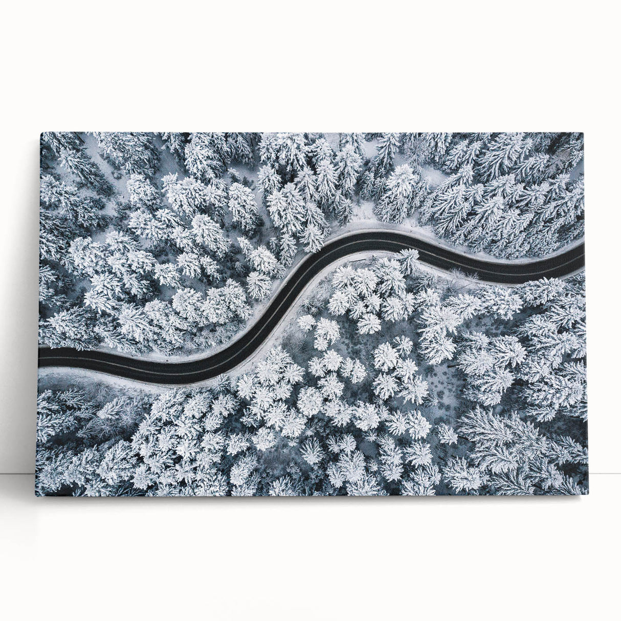Stretched canvas artwork showcasing a serene landscape with winding roads and vibrant colors, perfect for enhancing home decor and creating a tranquil atmosphere.