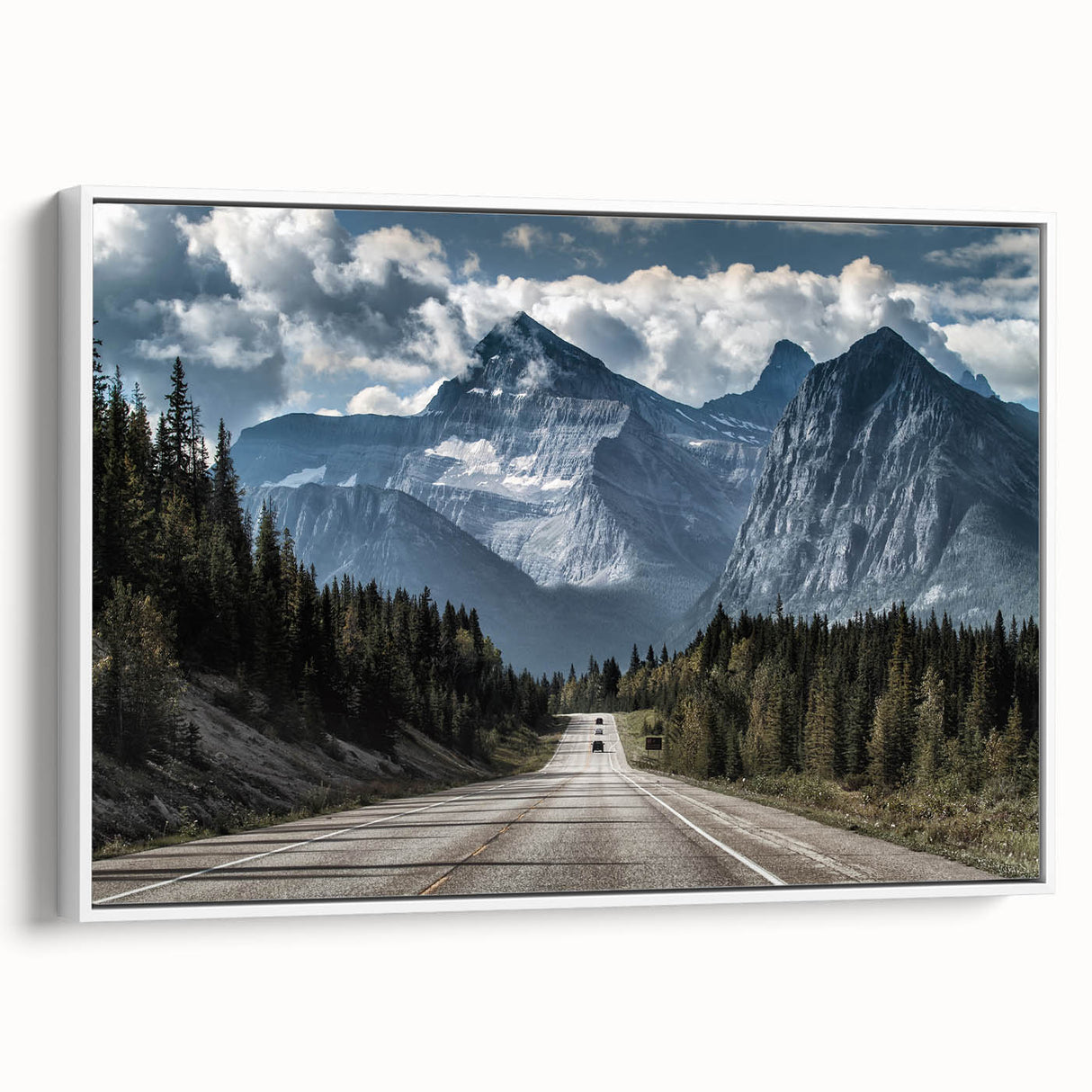 Framed canvas wall art showcasing a scenic landscape with winding roads, presented in a sleek white frame, perfect for enhancing modern home decor.