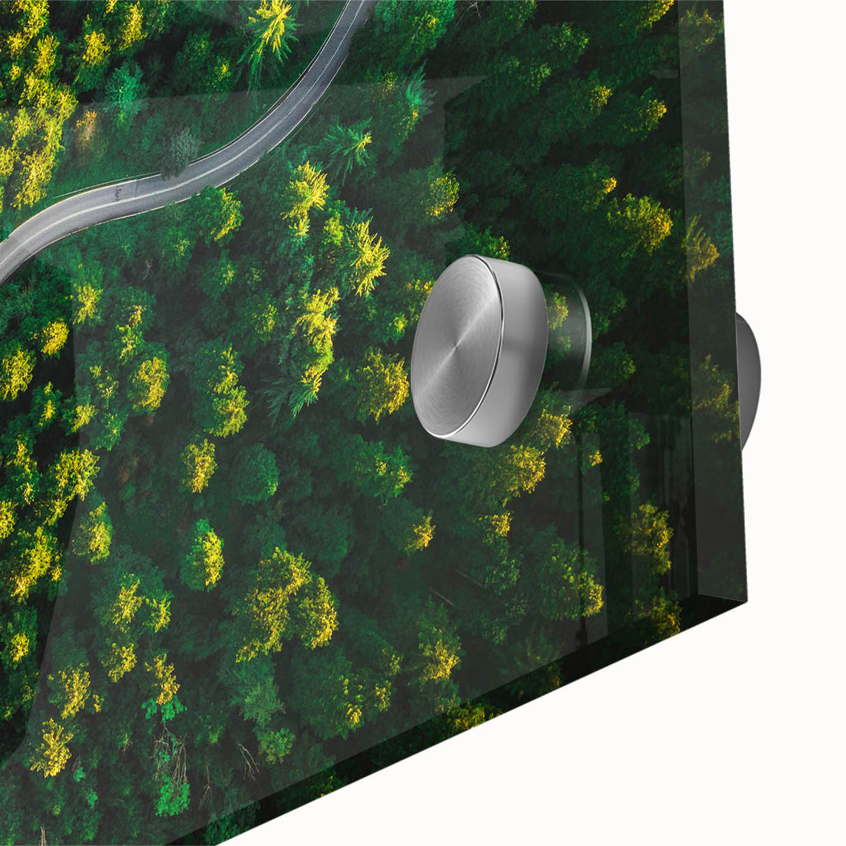 Close-up of a vibrant acrylic glass wall art piece showcasing a scenic landscape with winding roads, enhancing modern decor with its colorful details and artistic flair.