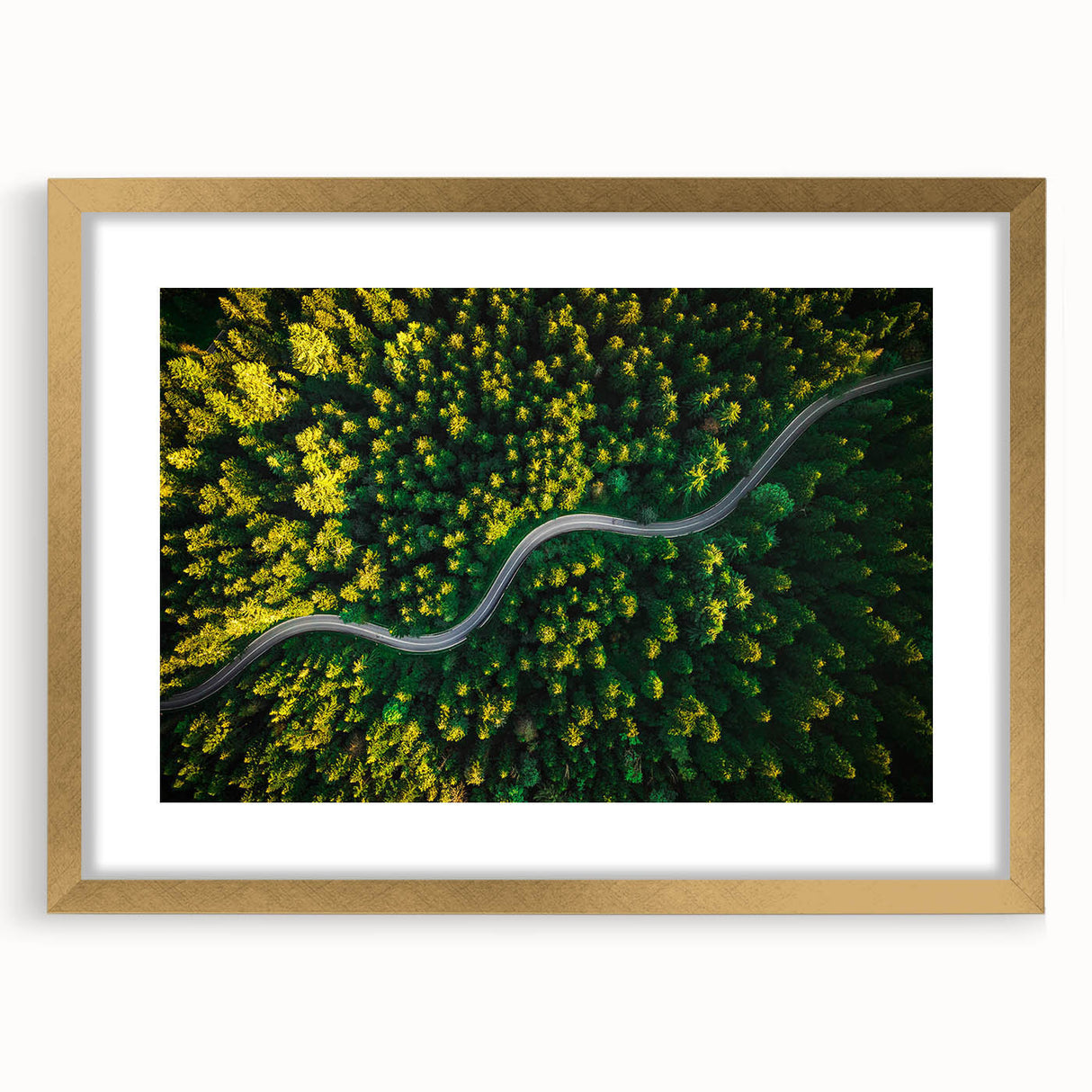Framed wall art featuring a scenic landscape with winding roads, elegantly designed with a gold mat, ideal for enhancing modern home decor.