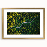 Framed wall art featuring a scenic landscape with winding roads, elegantly designed with a gold mat, ideal for enhancing modern home decor.