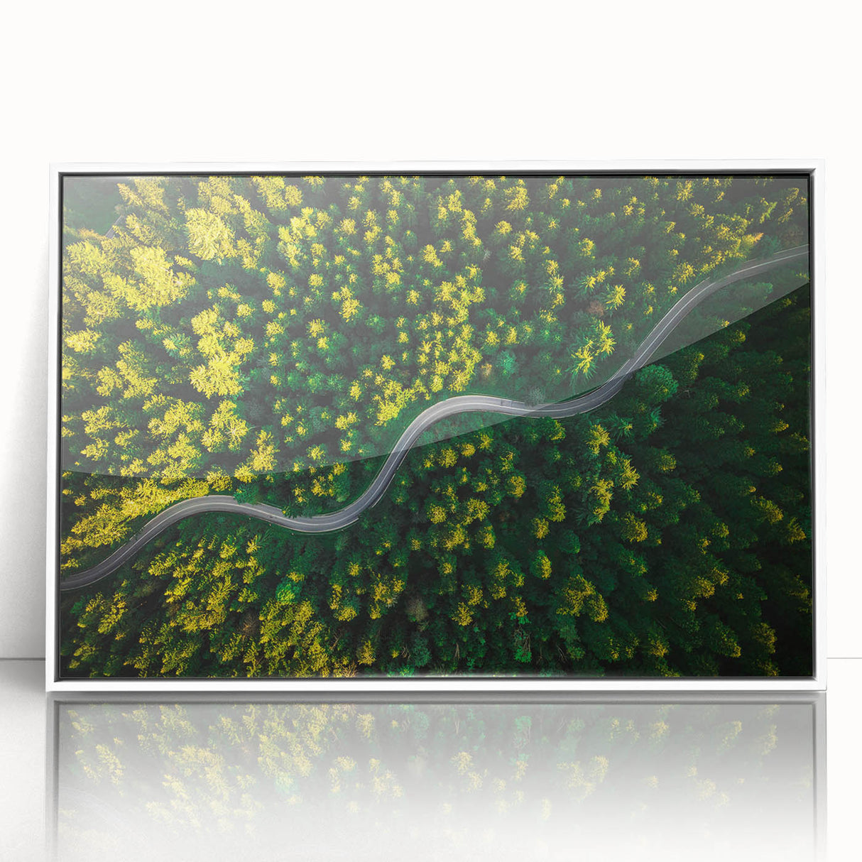 Framed acrylic wall art featuring a serene landscape with winding roads, set in a white frame, perfect for modern home decor or office spaces, showcasing vibrant colors and intricate details.