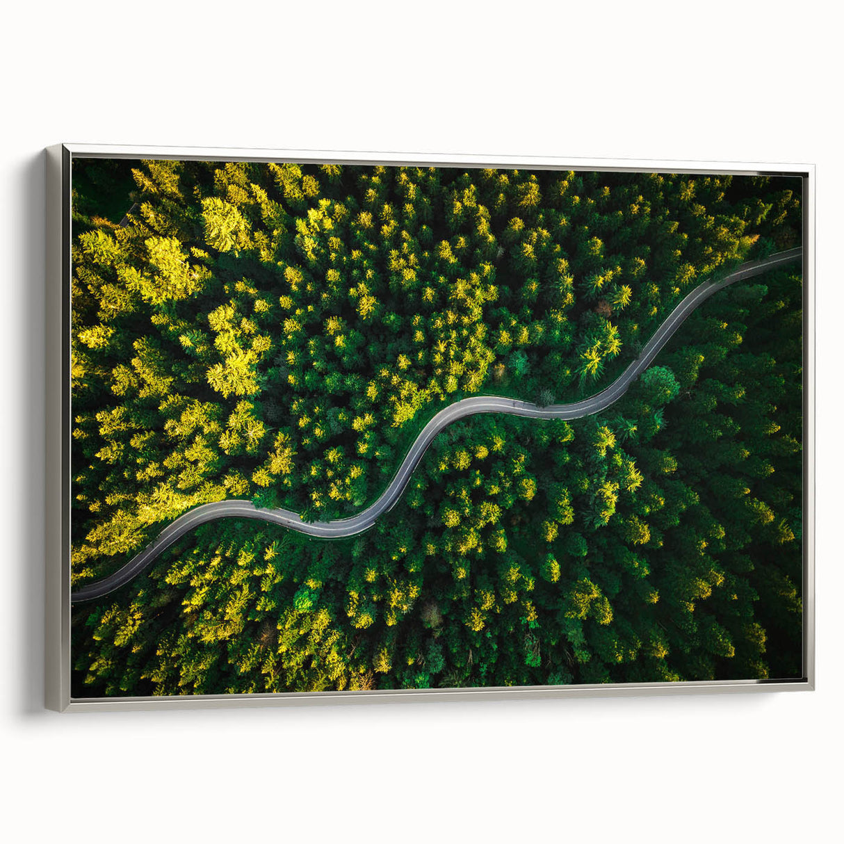 Framed canvas wall art featuring a striking landscape design with winding roads, set in a sleek silver frame. Ideal for modern home decor, adding elegance and depth to any space.