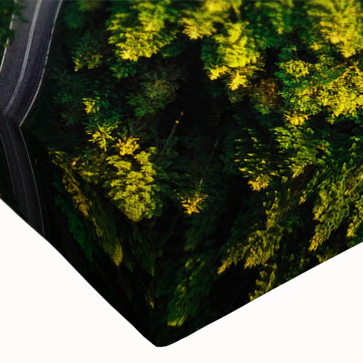 Close-up of a stretched canvas wall art piece featuring a vibrant landscape design with winding roads and lush greenery, ideal for home decor enhancement.