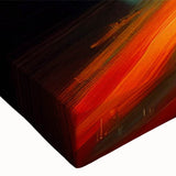 Close-up of a stretched canvas wall art piece showcasing a vibrant landscape design featuring winding roads and lush greenery, ideal for home decor.