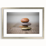 Framed wall art collection featuring a serene landscape with rocks, presented in a silver frame with a matte finish, ideal for modern home decor.