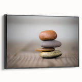 Framed canvas wall art showcasing a serene landscape with rocky formations, featuring a sleek black frame and side view that highlights its elegant design for modern decor.