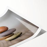 Vibrant landscape wall art print showcasing colorful rocky formations against a serene sky, rolled and packaged in a protective tube for easy display.