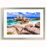 Framed wall art collection featuring a serene landscape design with textured rocks and vibrant colors, elegantly presented in a silver frame with matting. Ideal for enhancing home décor and bringing a touch of nature indoors.