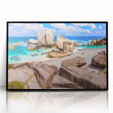 Framed acrylic wall art showcasing a modern landscape design with textured rocks, presented in a sleek black frame, ideal for contemporary home decor.