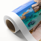 Vibrant rolled canvas showcasing a stunning landscape featuring rocky formations under a bright blue sky, perfect for modern home décor and art collectors.