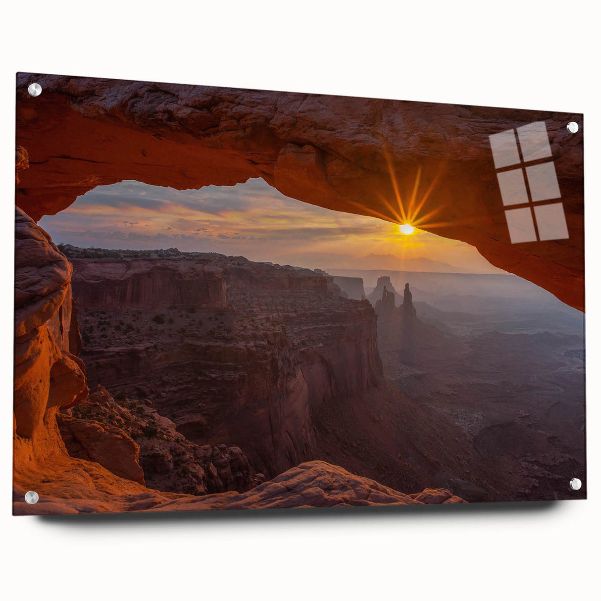 Acrylic glass wall art design showcasing a serene landscape with layered rocks in earthy tones, viewed from the side with pins securing it to the wall. Ideal for home decor.