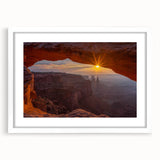 Framed wall art showcasing a serene landscape with rocks, featuring a white mat and sleek frame, ideal for enhancing modern home decor aesthetics.