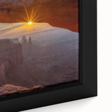 Close-up of a framed canvas wall art piece showcasing a vibrant landscape with intricate rock formations, blending earthy tones of brown and green for a nature-inspired decor accent. Perfect for enhancing home aesthetics.