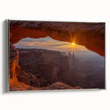 Framed canvas wall art showcasing a landscape design with rocky formations, featuring a silver frame and side view, ideal for modern home decor.
