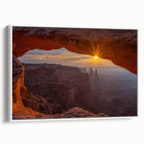 Framed canvas wall art showcasing a serene landscape with textured rocks and natural hues, elegantly displayed from a side view against a white background.