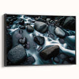 Framed canvas wall art showcasing a stunning landscape with rocks, designed for modern decor, featuring a sleek black frame and side view display. Perfect for enhancing interior spaces.